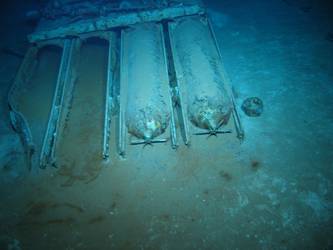 Quadruple torpedo tube mount on seabed - two weapons loaded
